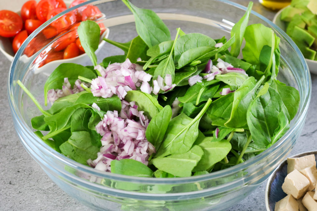 spinach and onion in bowl