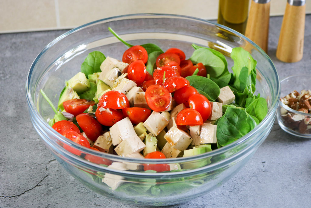 spinach, tomatoes and tofu in bowl