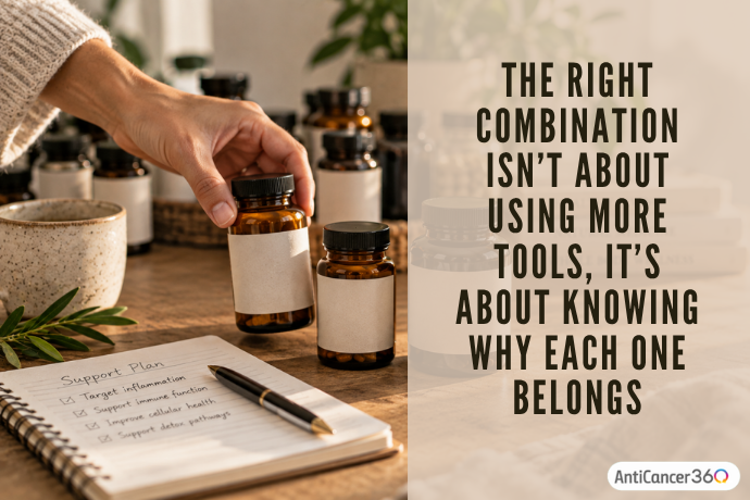A hand selecting a supplement bottle beside a notebook and other bottles, illustrating the importance of understanding why each tool belongs in an individualized cancer care plan.
