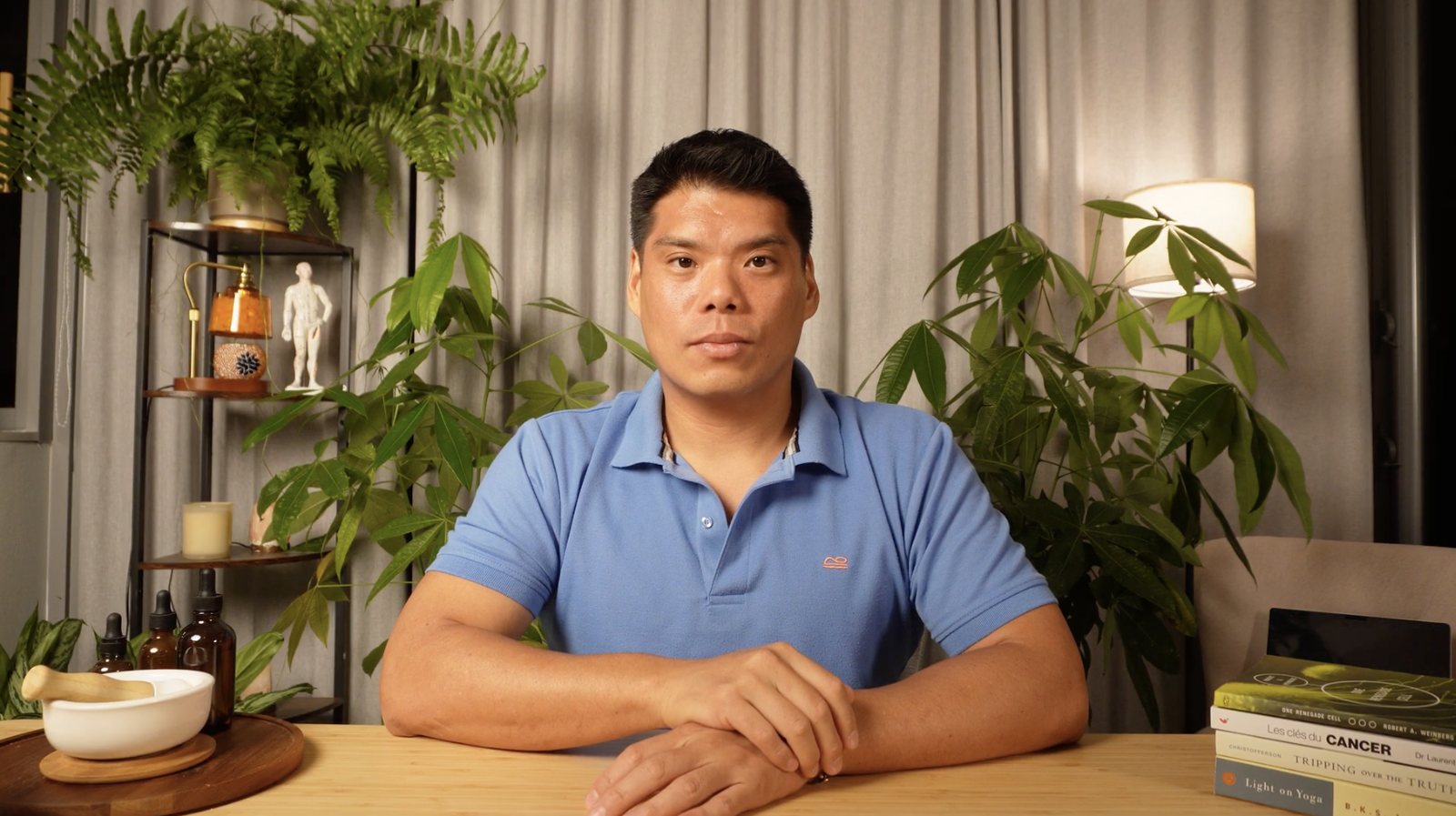 Gene Wei, Doctor of Oriental Medicine, in his practice